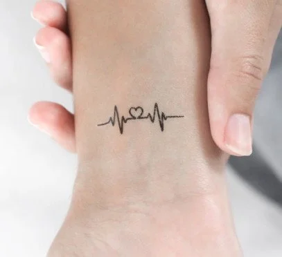 Heartbeat line tattoo