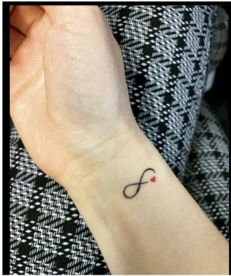 Wrist infinity tattoo