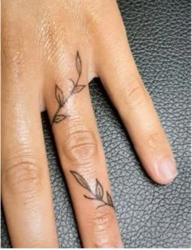 Finger leaf wrap tattoo