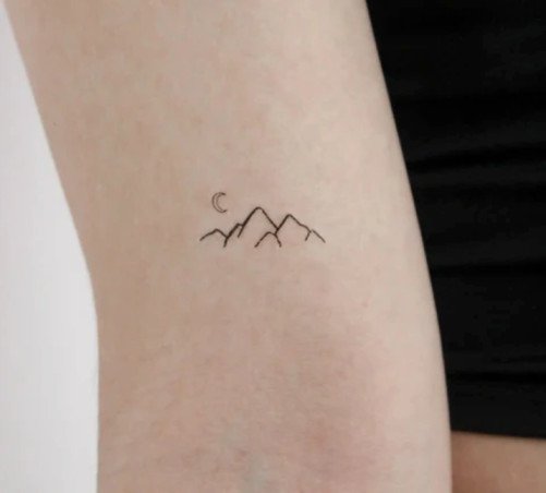 Mountain and moon tattoo