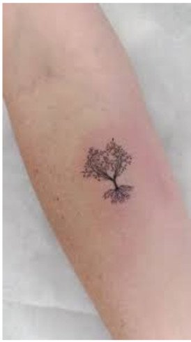 Tree tattoo with roots