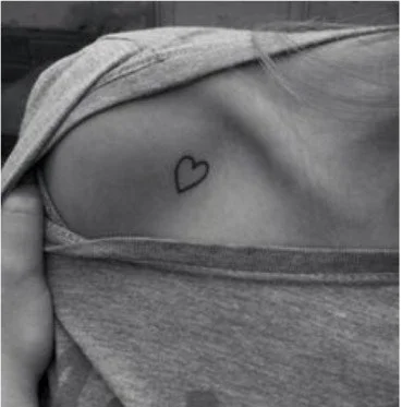 Small heart shoulder tattoo
