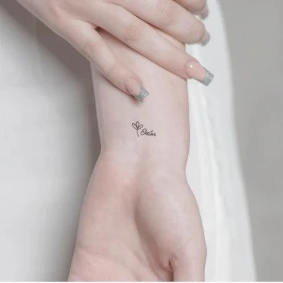 Calm letter tattoo