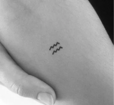 Aquarius zodiac tattoo
