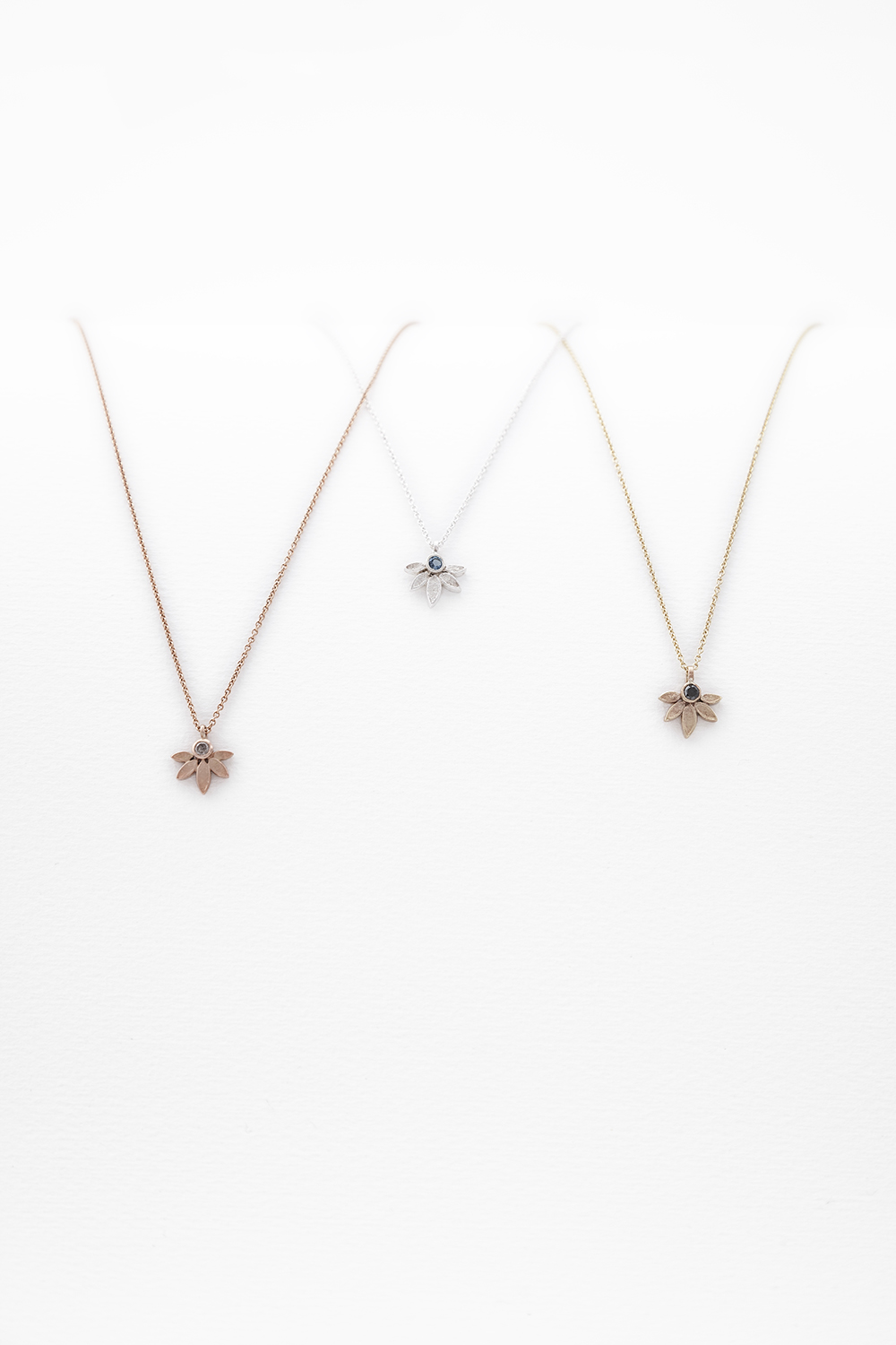 Lotus Pendants in Silver and Golds