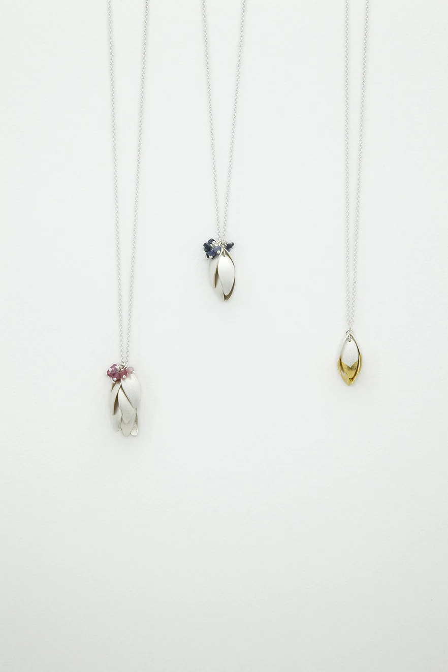 silver nestling pendants.jpg