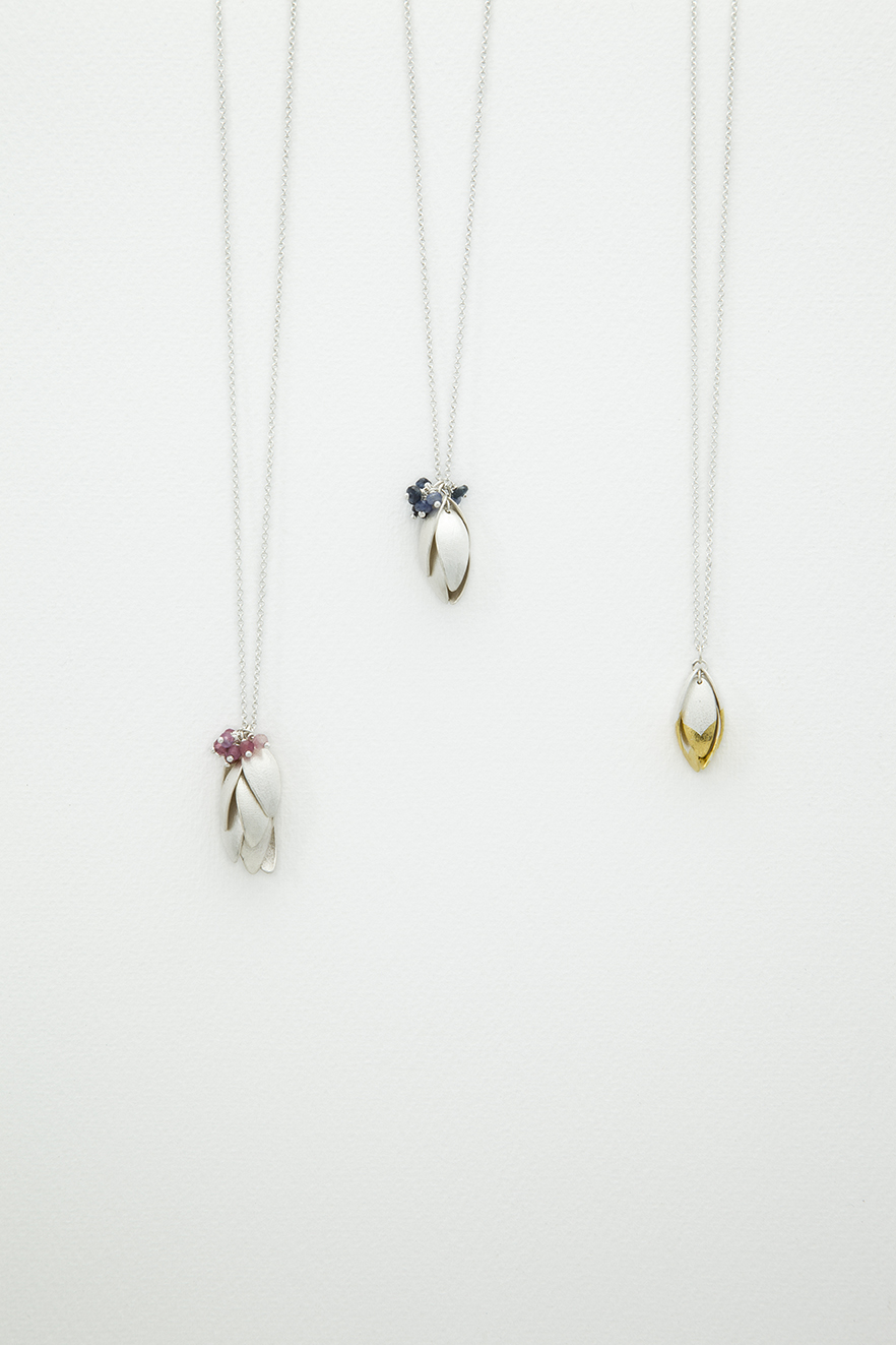 silver nestling pendants.jpg