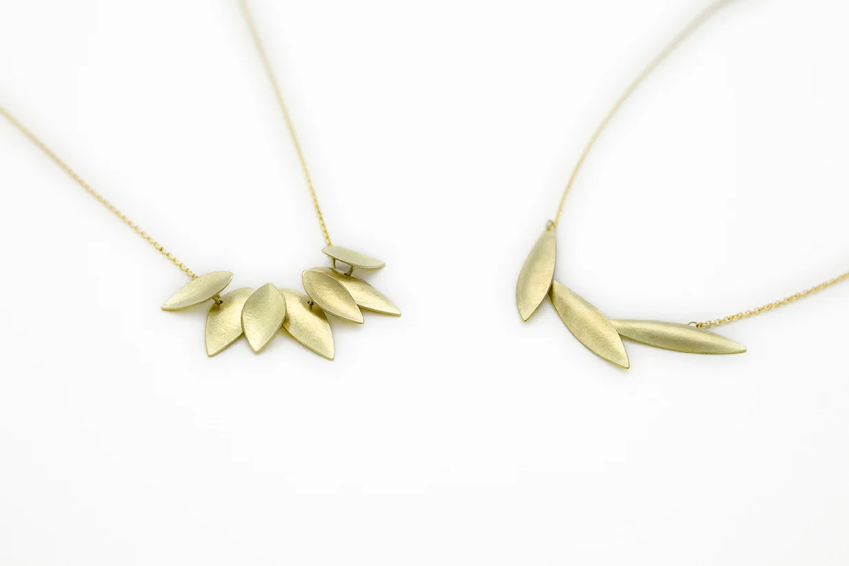 18ct Sunflower Pendant and Plume Pendant