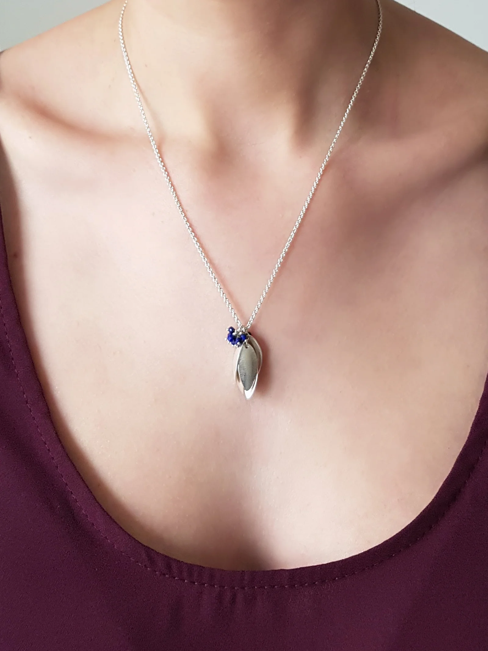 Nestling Pendant being worn.jpg