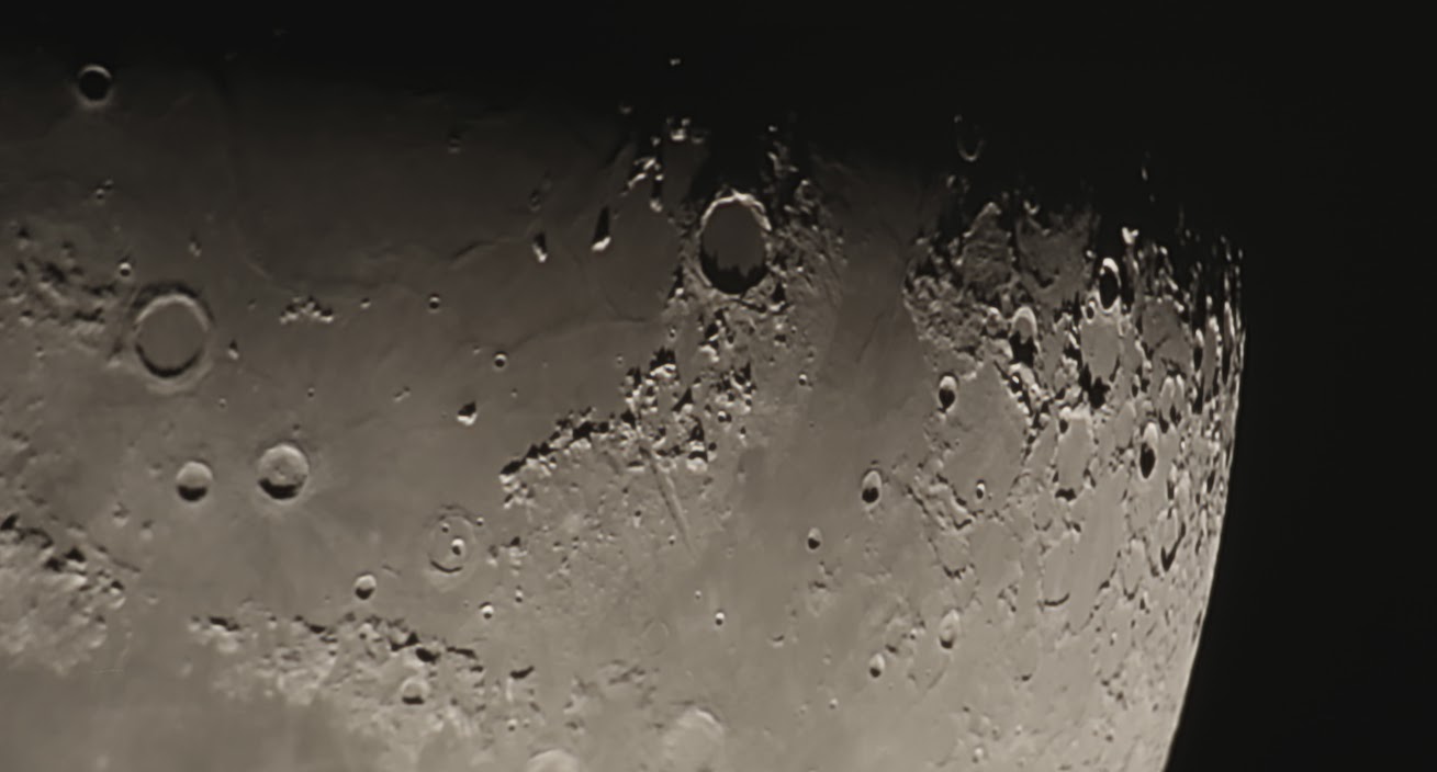 Mare Imbrium through the Barlow lens of my Celestron 8SE. The prominent crater Plato can be seen top center. Camera: Canon 70D.