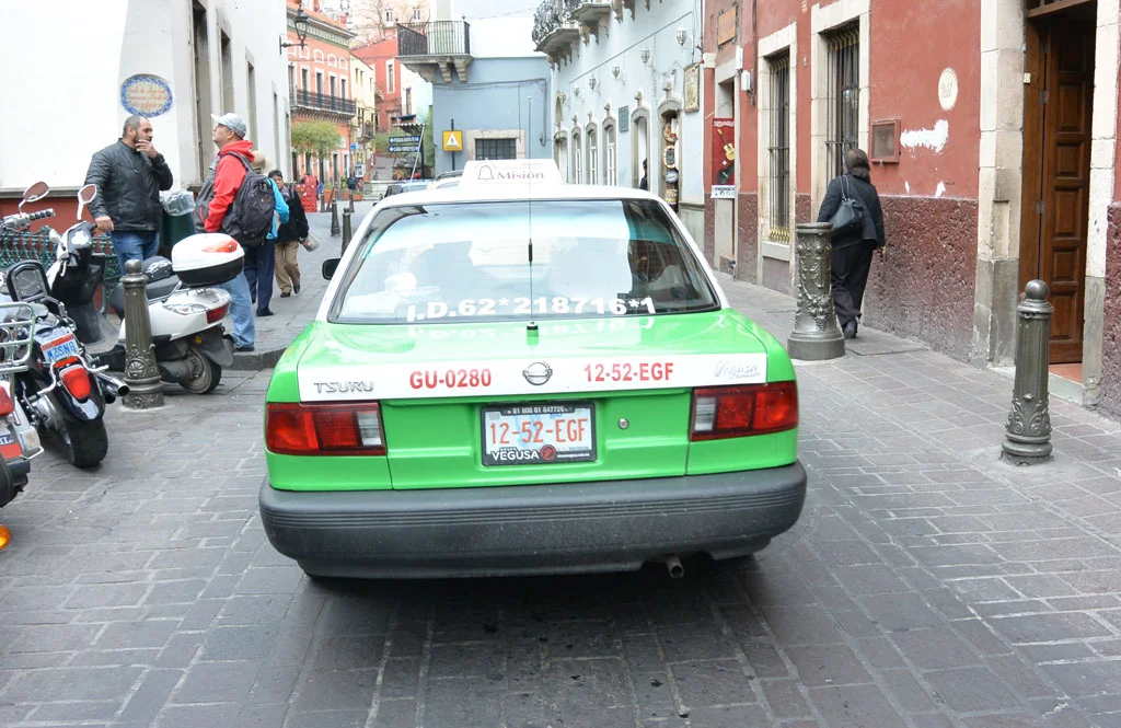 Why You're Getting Ripped Off By Every Taxi In Mexico Feather and the