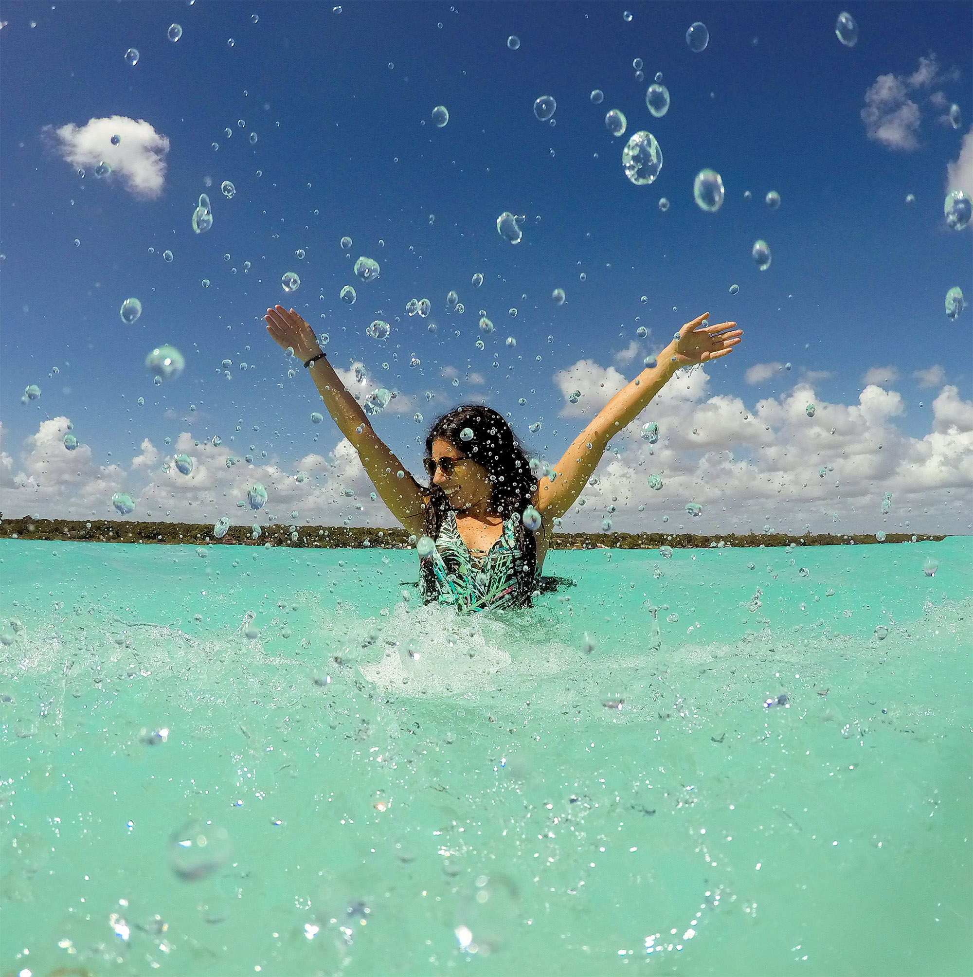 The Ultimate Travel Guide to Bacalar, Mexico Feather and the Wind