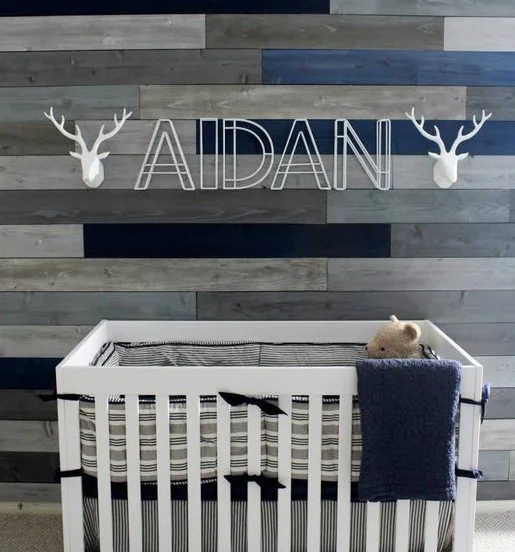 wood accent wall nursery