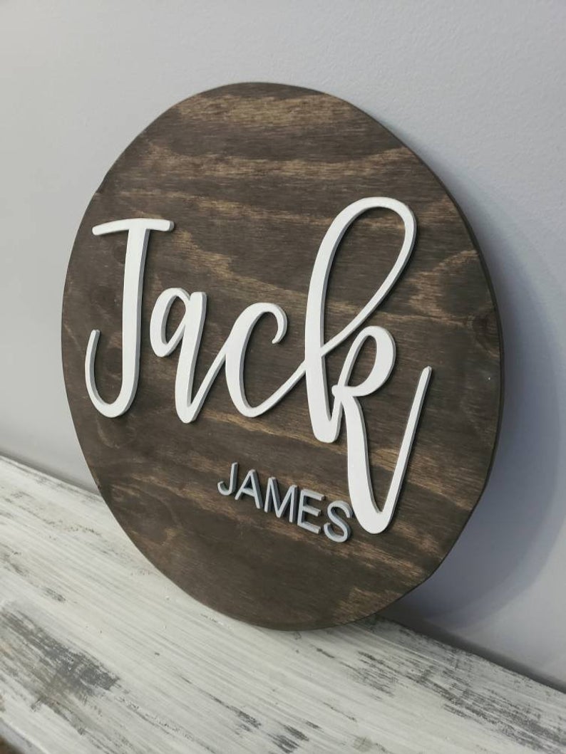 round wooden nursery sign for above crib