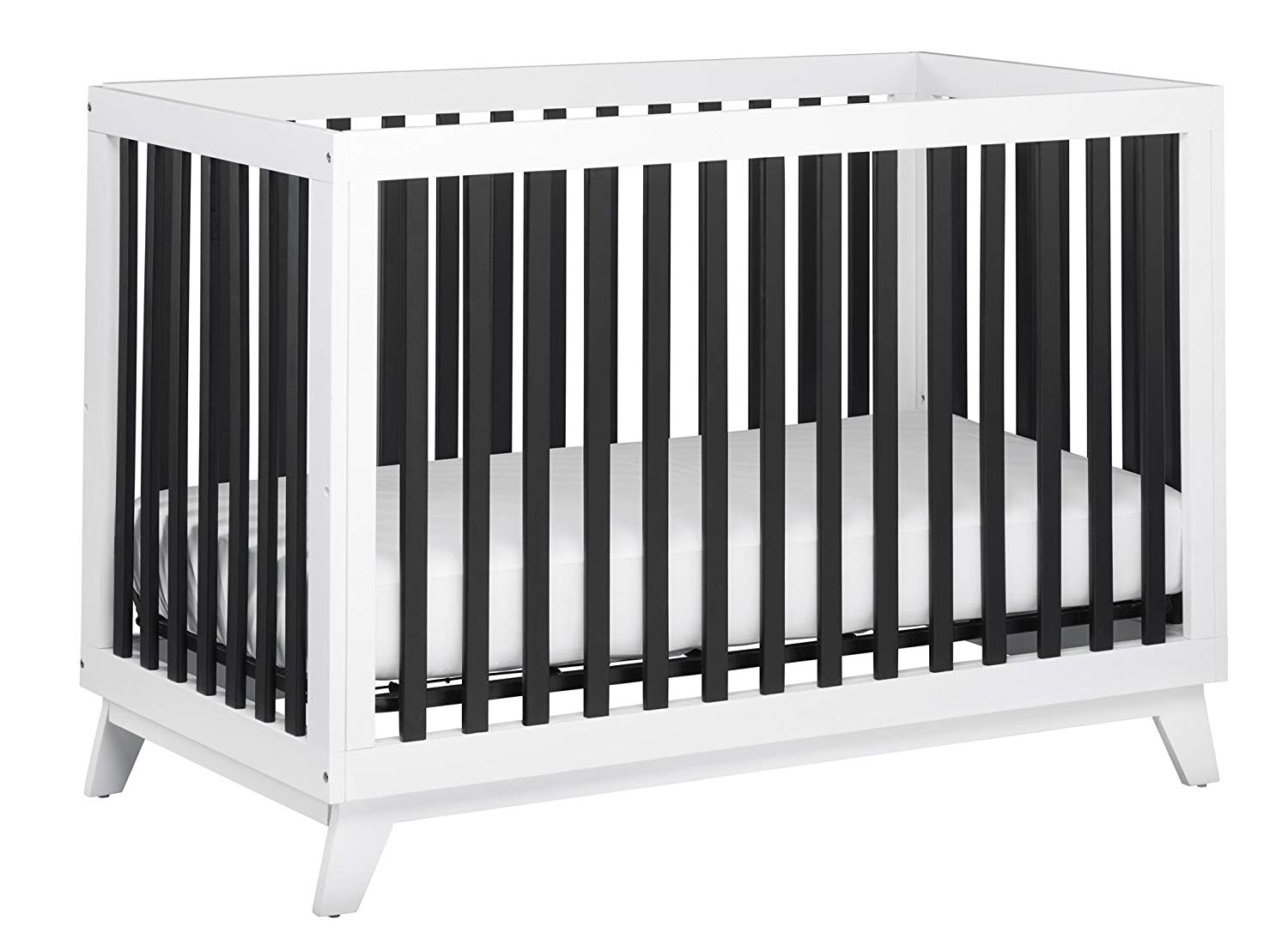 white crib with black bars