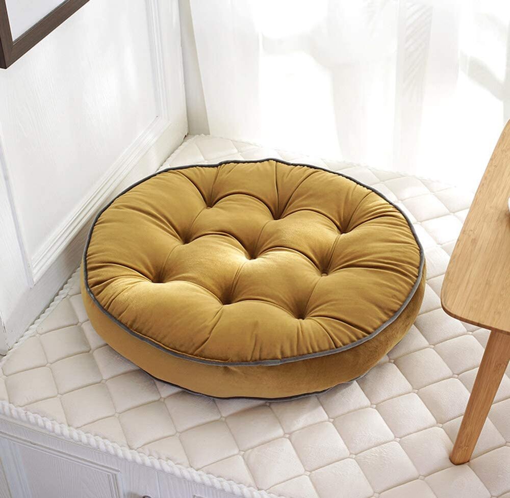 yellow round floor cushion