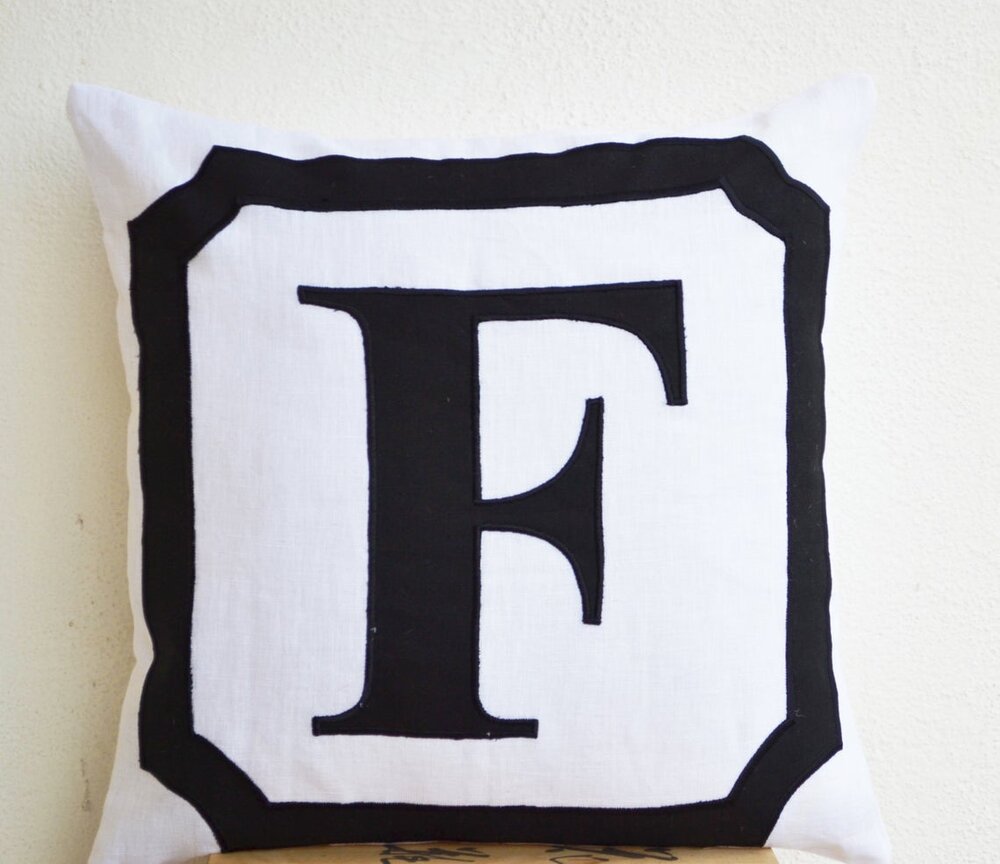 black and white monogram cushion