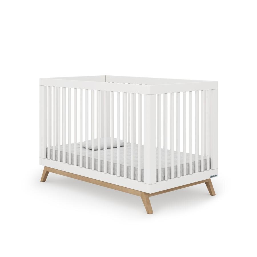 white and wood modern crib