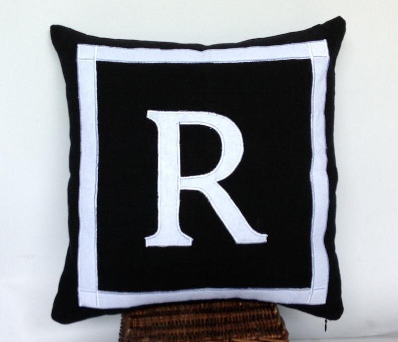 black monogram cushion
