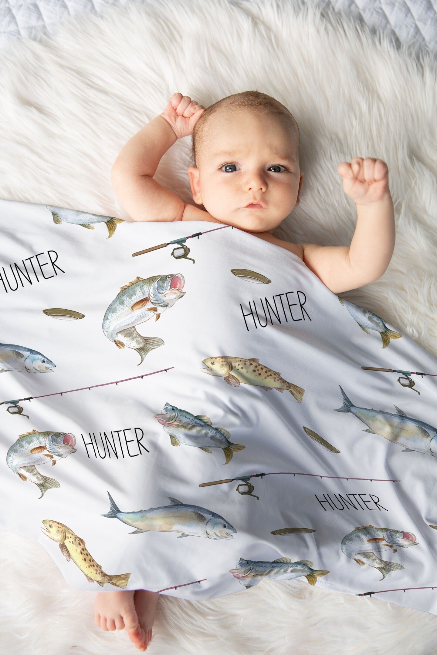 This swaddle blanket would be perfect for a fishing themed nursery! A matching hat or headband are also available!
