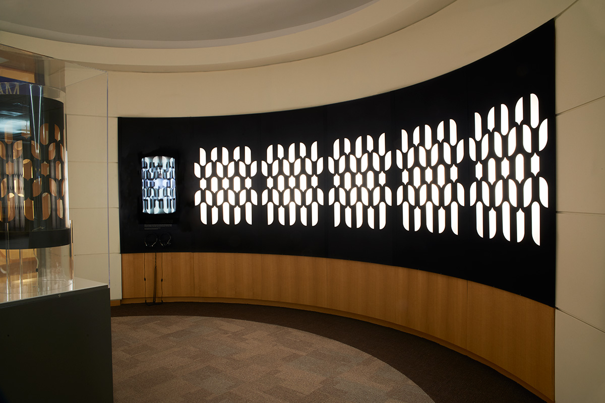 View of gallery showing light boxes featuring the pattern of the Dreammachine.