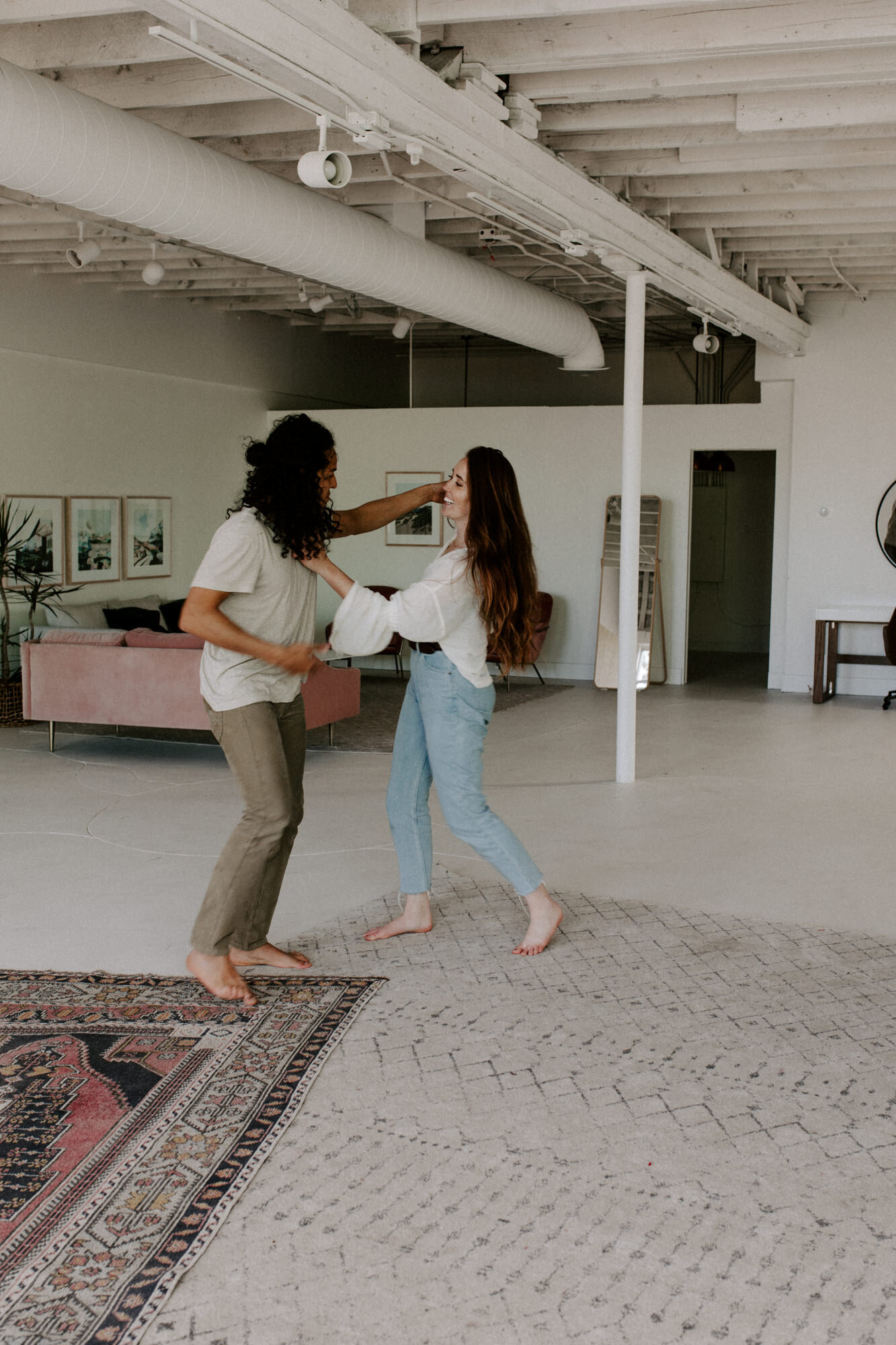 During an in home photography session with wedding photographer Diana Coulter, a Denver, Colorado couple dances together before social distancing and quarantine