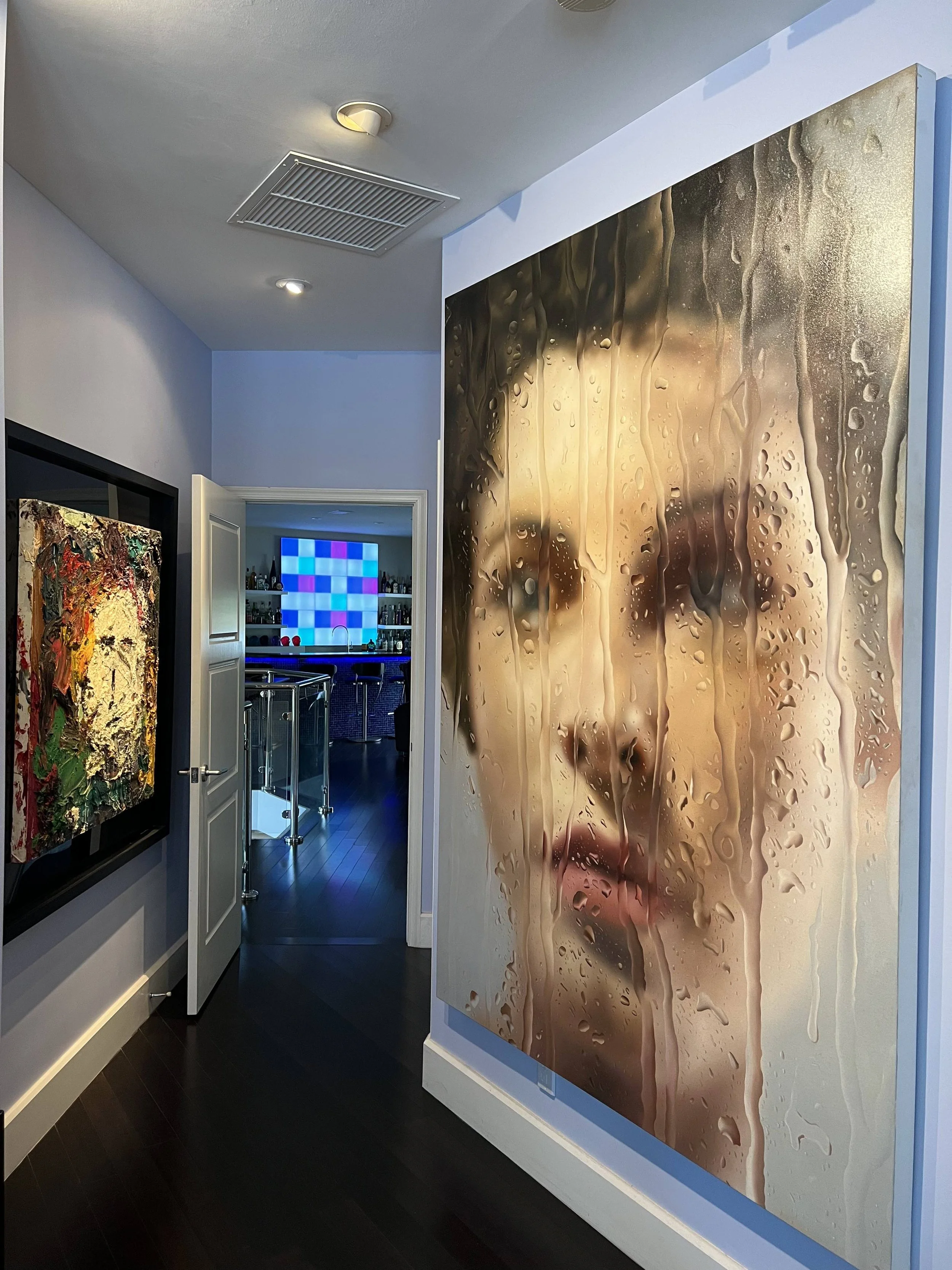An image of artwork in a private collection featuring a large painting by Darian Rodriguez Mederos acquired from Conde Contemporary art gallery.