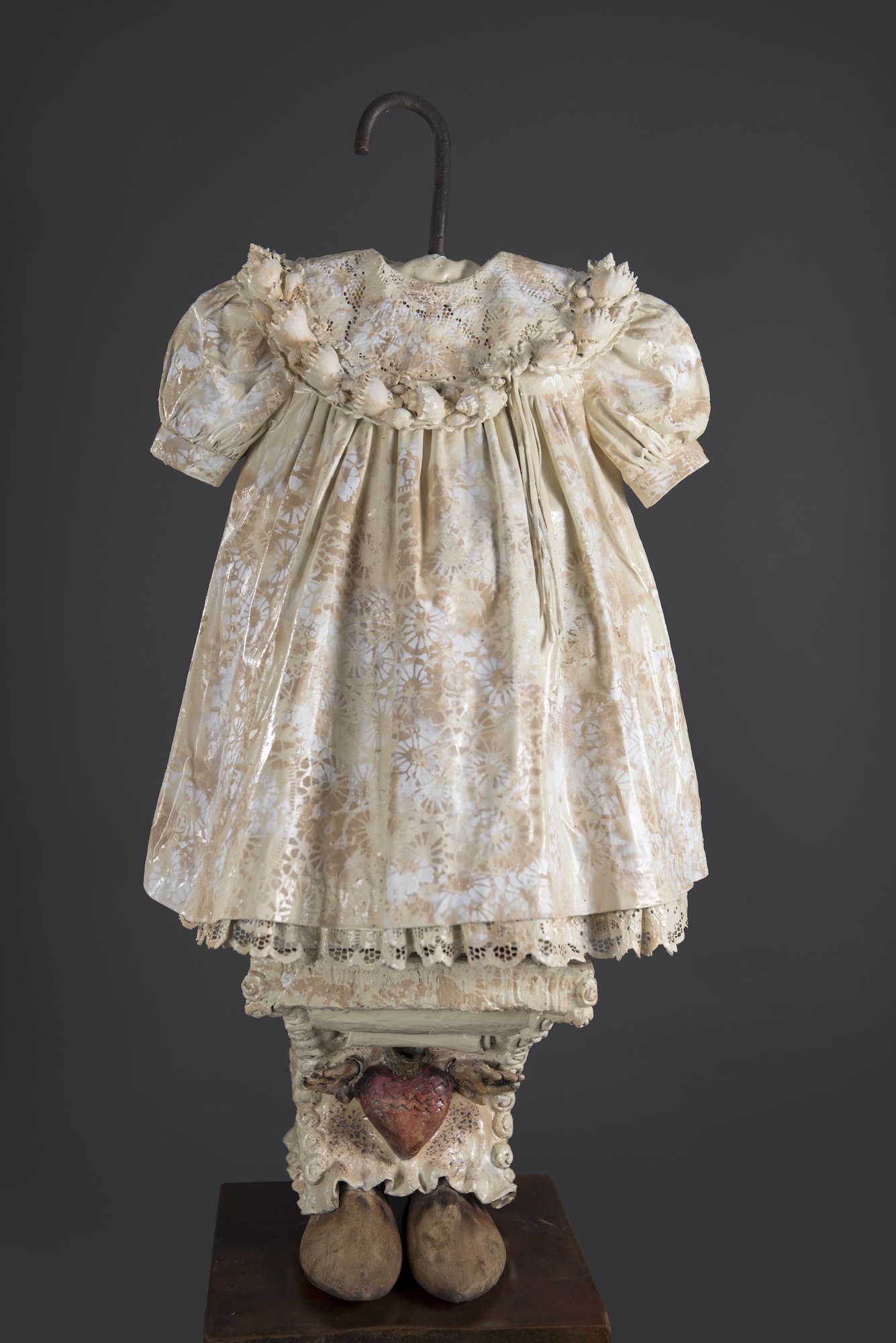 A mixed media sculpture of a dress by contemporary Cuban artist Aimee Perez for Conde Contemporary.