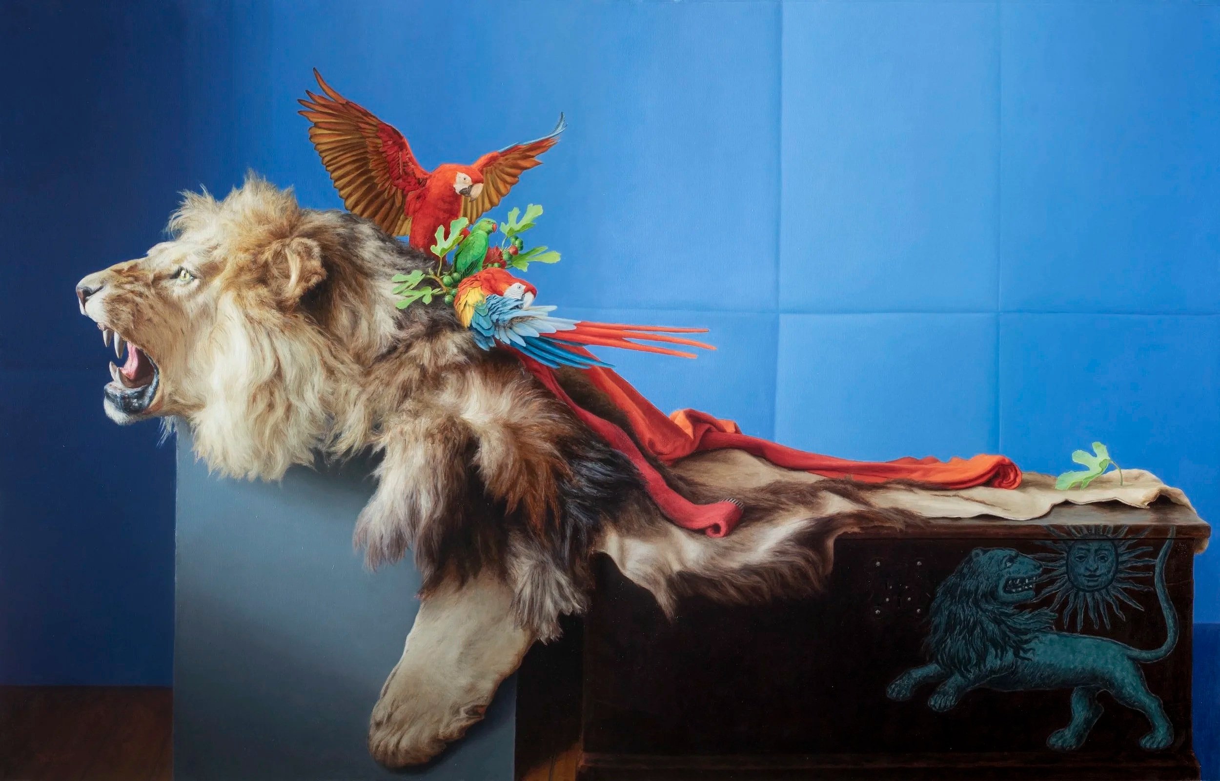 The painting titled Lion with Guacamayas by contemporary Latin American artist Pablo Santibáñez Servat, depicting a lion skin with parrots standing on it, available at Conde Contemporary.