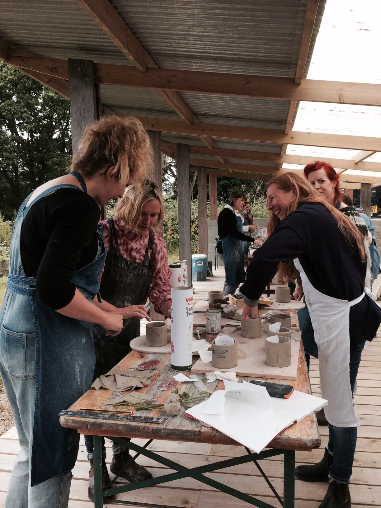 Photo Credit: Flora Jamieson. I had two groups of on average 20 ladies in each group back to back with a slurp of tea and a slice of cake in between. If I am asked to do it next year I will take roller skates for extra speed to get from one end of the barn to the other....... At this point I would like to say a special thank you to Sarah for helping me prepare the clay for my second workshop.