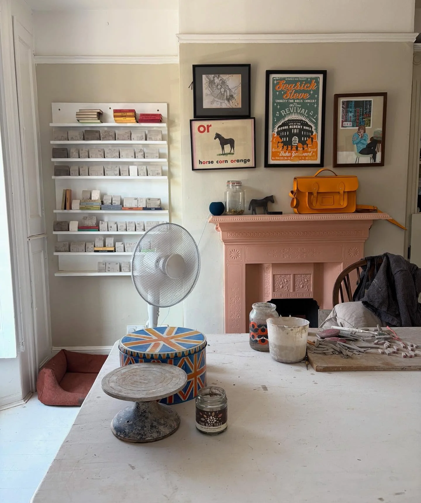 My studio. This is where I sit and make all my houses and other creations. It is a beautiful light room with two big bay windows. 

It used to be our sitting room and as you can imagine we would only go in there in the evenings and try and block out 