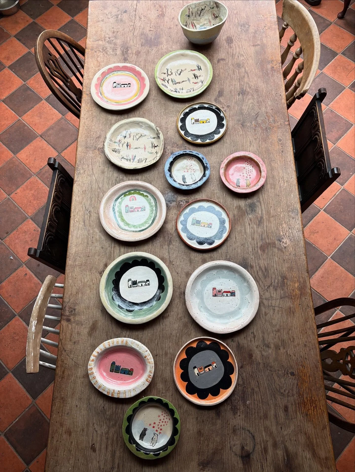 Oh joyful kiln opening. Love everything that jumped out of the kiln this morning. Lots of houses plates and a few wild swimmers plates and a bowl. Also some very sweet dishes with bears and stars. 

I will let you know on here when they are in the sh