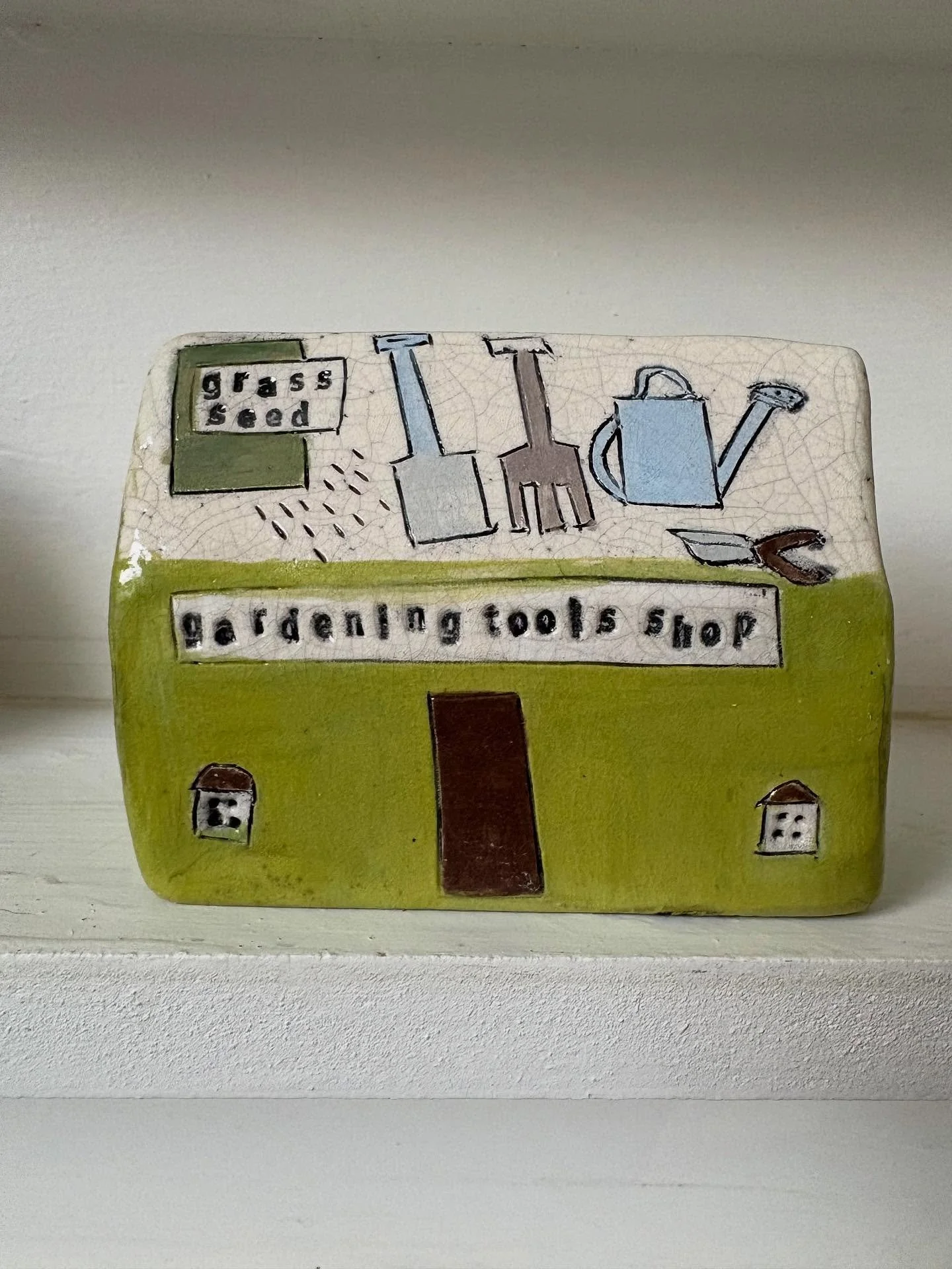 There are two garden tool shops in my studio and for sale in my online shop right now and every time I look at them I am reminded that I forgot to plant any new bulbs for spring and I wonder if I can pop a few in the ground still as the weather is so