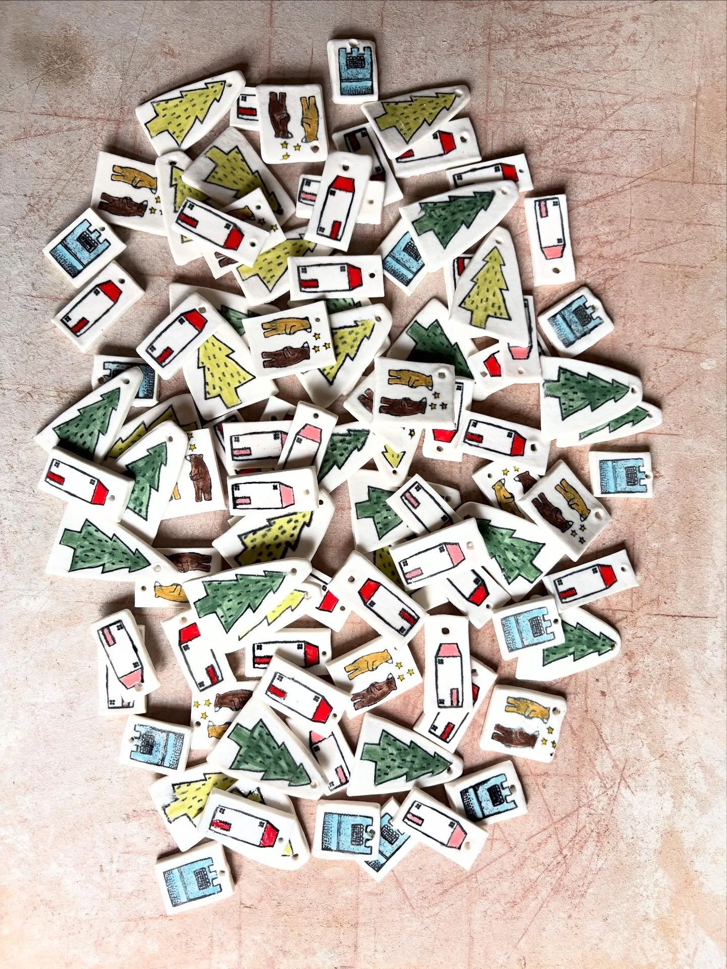 Hundreds and thousands. 

Christmas decorations which will be available in my next online sale. Now I have some pieces fired and ready for action I can emerge back on to Instagram to show you my wares. 

These decorations will be sold in groups of fi