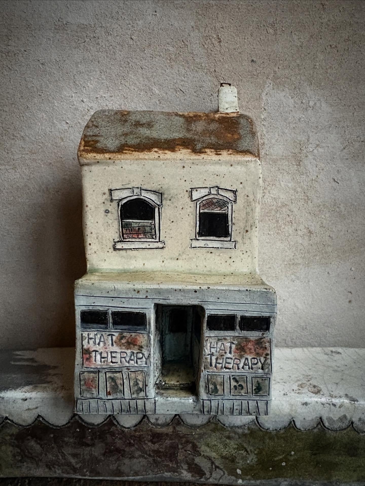 Landmarks in Hebden Bridge. 
 
You are never fully dressed without a hat. 

For the exhibition &ldquo;portrait of a northern town &ldquo; at The Heart Gallery, Hebden Bridge. Opens January 18th 2026

#amandabanhamceramics #ceramics #milinery