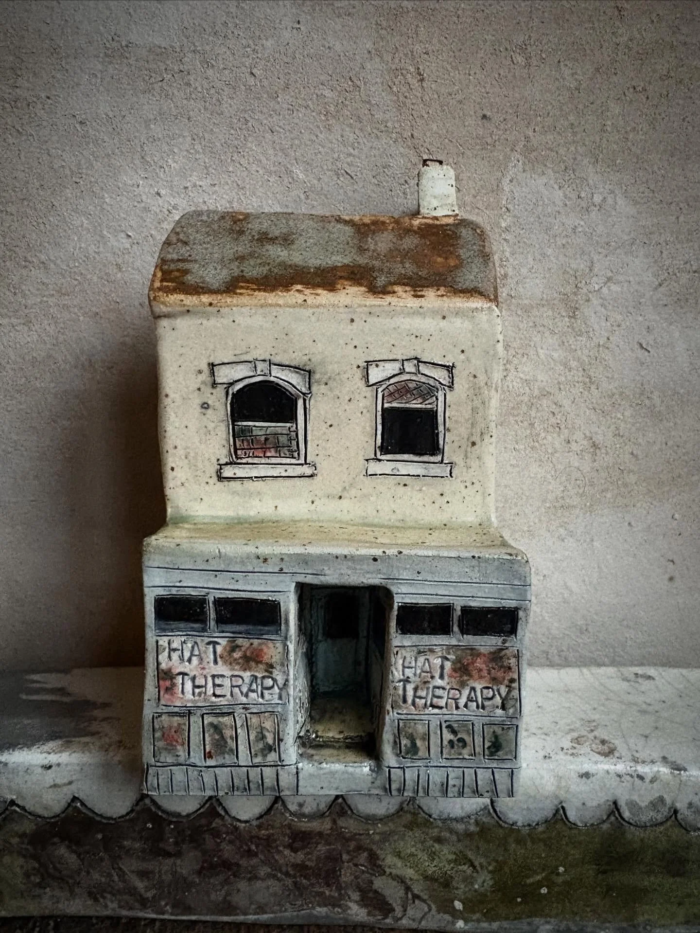 Landmarks in Hebden Bridge. 
 
You are never fully dressed without a hat. 

For the exhibition &ldquo;portrait of a northern town &ldquo; at The Heart Gallery, Hebden Bridge. Opens January 18th 2026

#amandabanhamceramics #ceramics #milinery