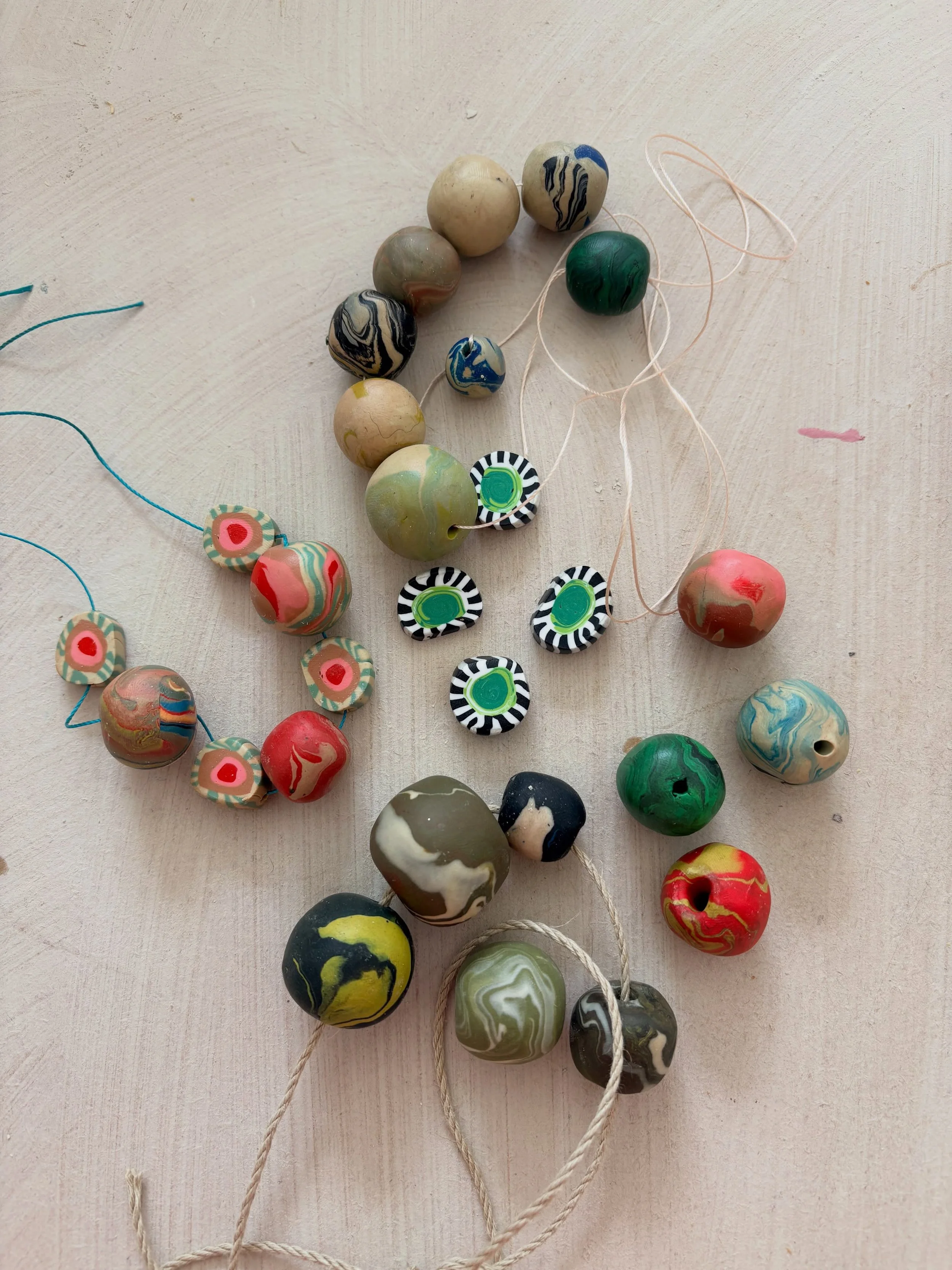 All the way through watching the World Cup I have been making beads in polymer clay. I have been making my own &ldquo;recipes&rdquo; for blending colours and am completely entranced and addicted to them. 

Having nearly finished reuniting all of the 
