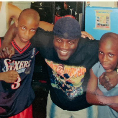 Dez 9 years old and his brother with Joshua Clottey