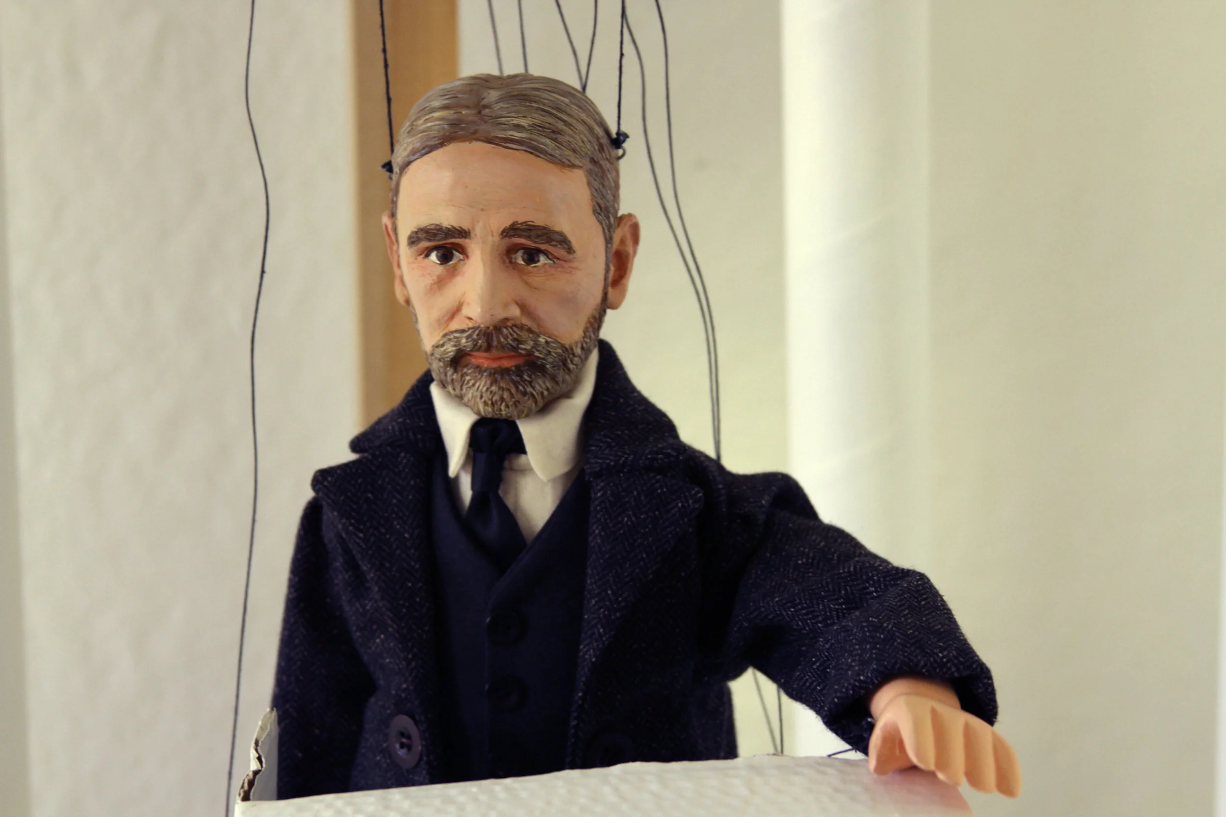 The Reverend, His Lover, Their Monet, and The Museum , Reverend Wolcott look-alike marionette, wood composite, wood, fabric, pigment, string, 2016