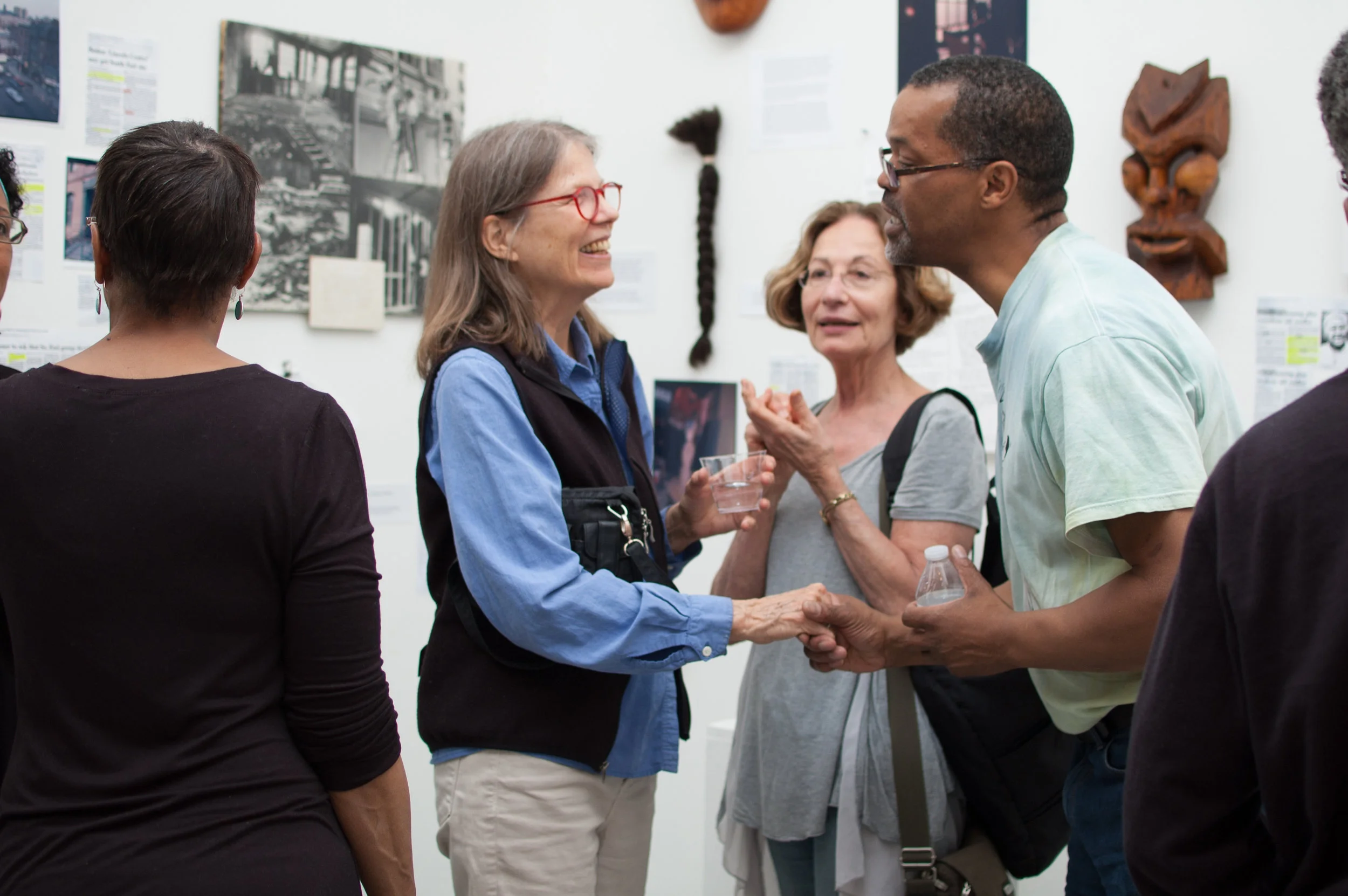 How many artists does it take to change (a light bulb)? , Chris Cato with long time BCA artist tenant, exhibition opening reception, Mills Gallery, Boston Center for the Arts, Boston, MA, 2014 (Photograph: Ashley Wood)