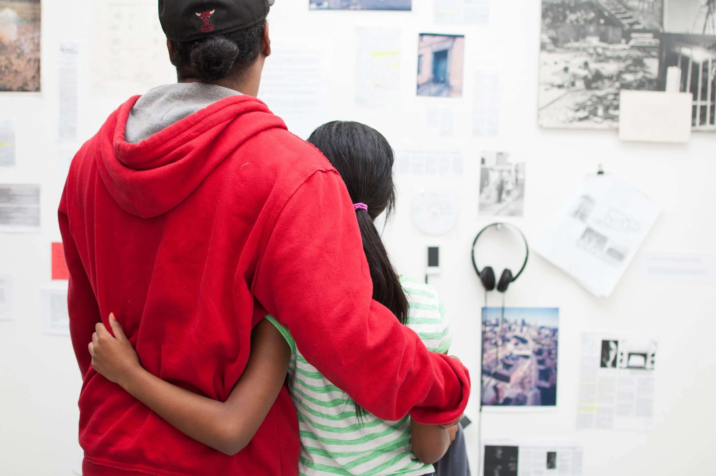 How many artists does it take to change (a light bulb)? , Roy Cato grandson and great granddaughter, exhibition opening reception, Mills Gallery, Boston Center for the Arts, Boston, MA, 2014 (Photograph: Ashley Wood)