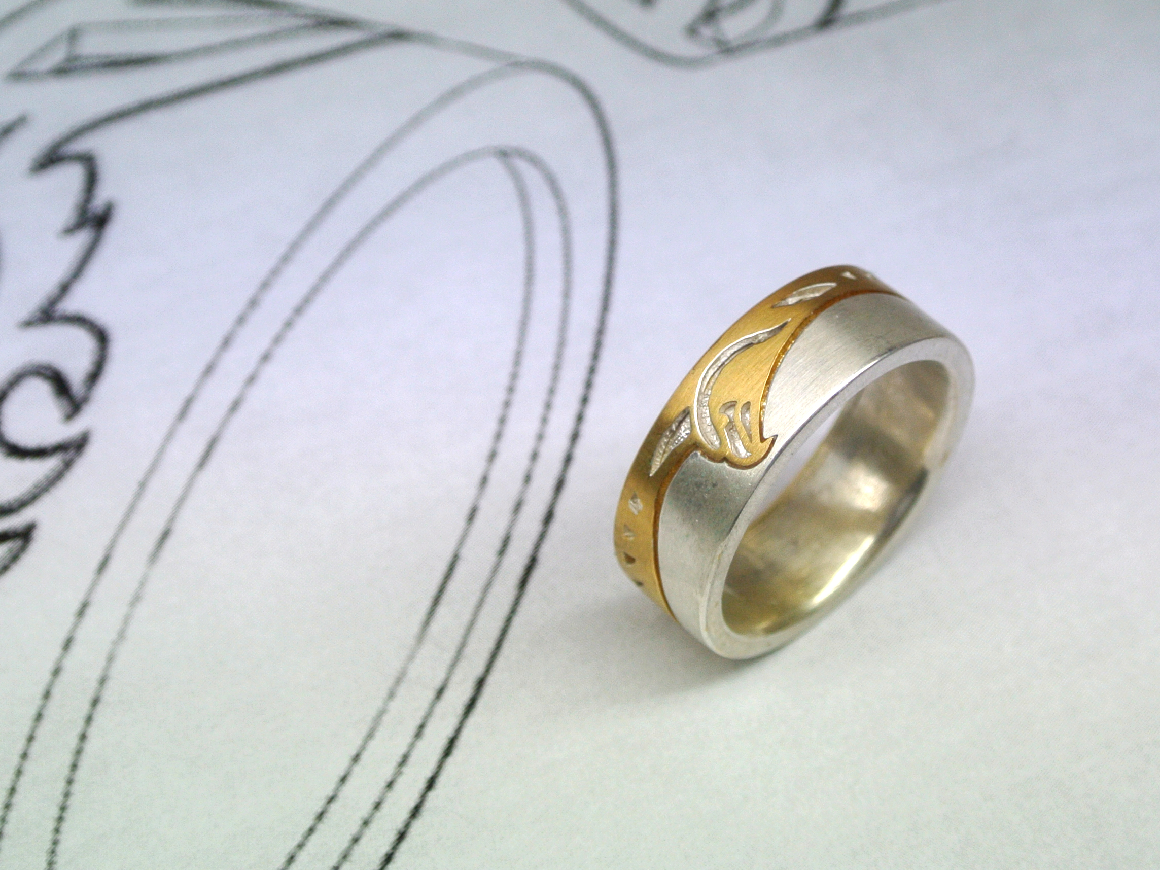 The silver draft. (bird gold plated)