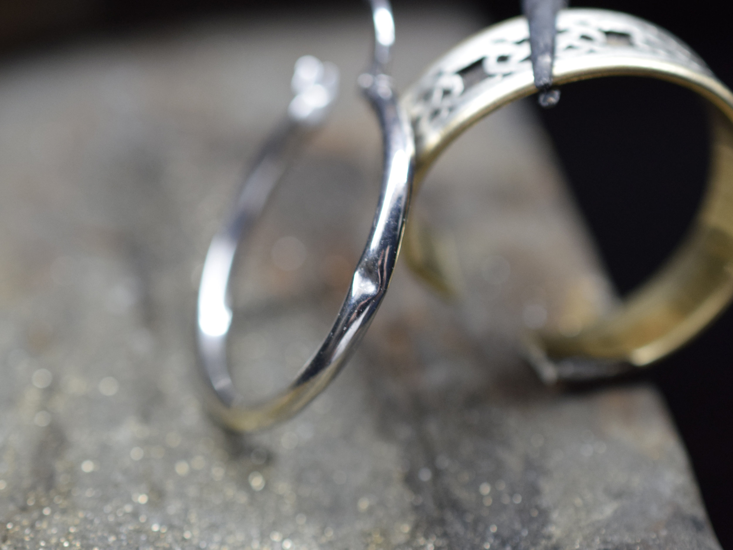 Common hoop earring with a dent.
