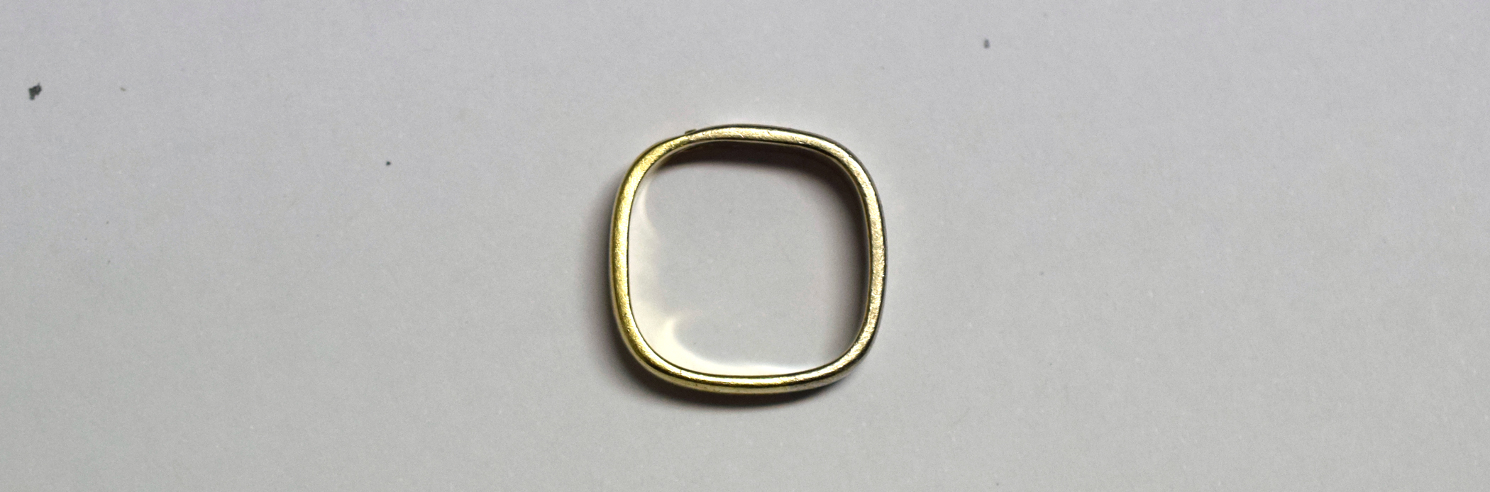 Square weding ring with limited depth.