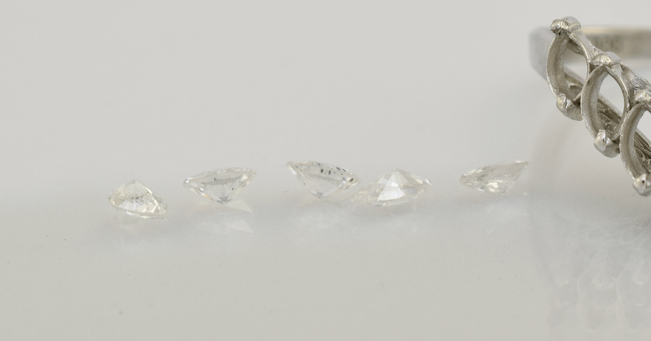 Visible spots of black carbon in the diamonds