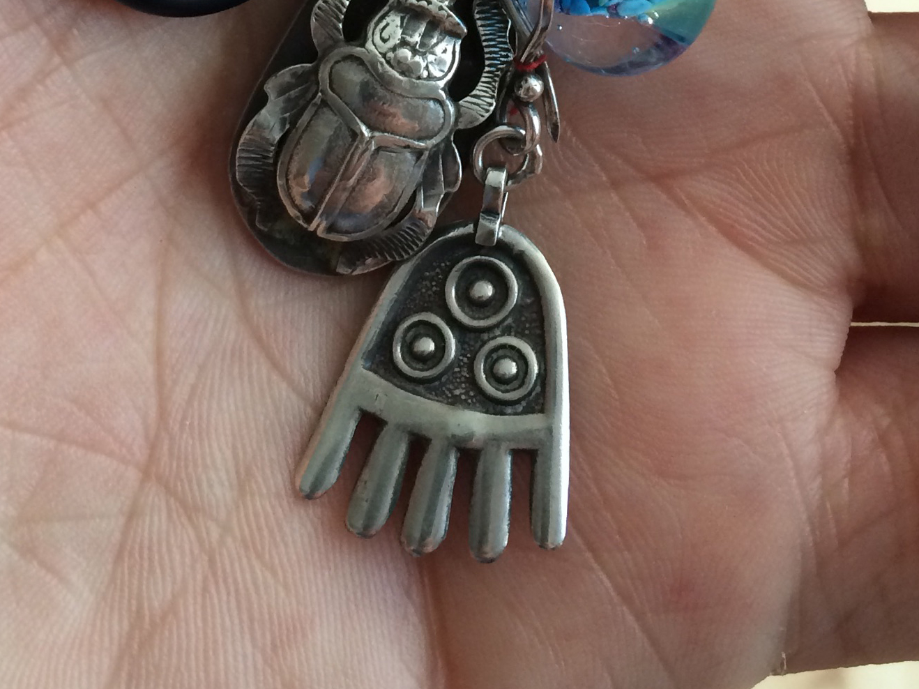 The original pendant/earring now lost.`