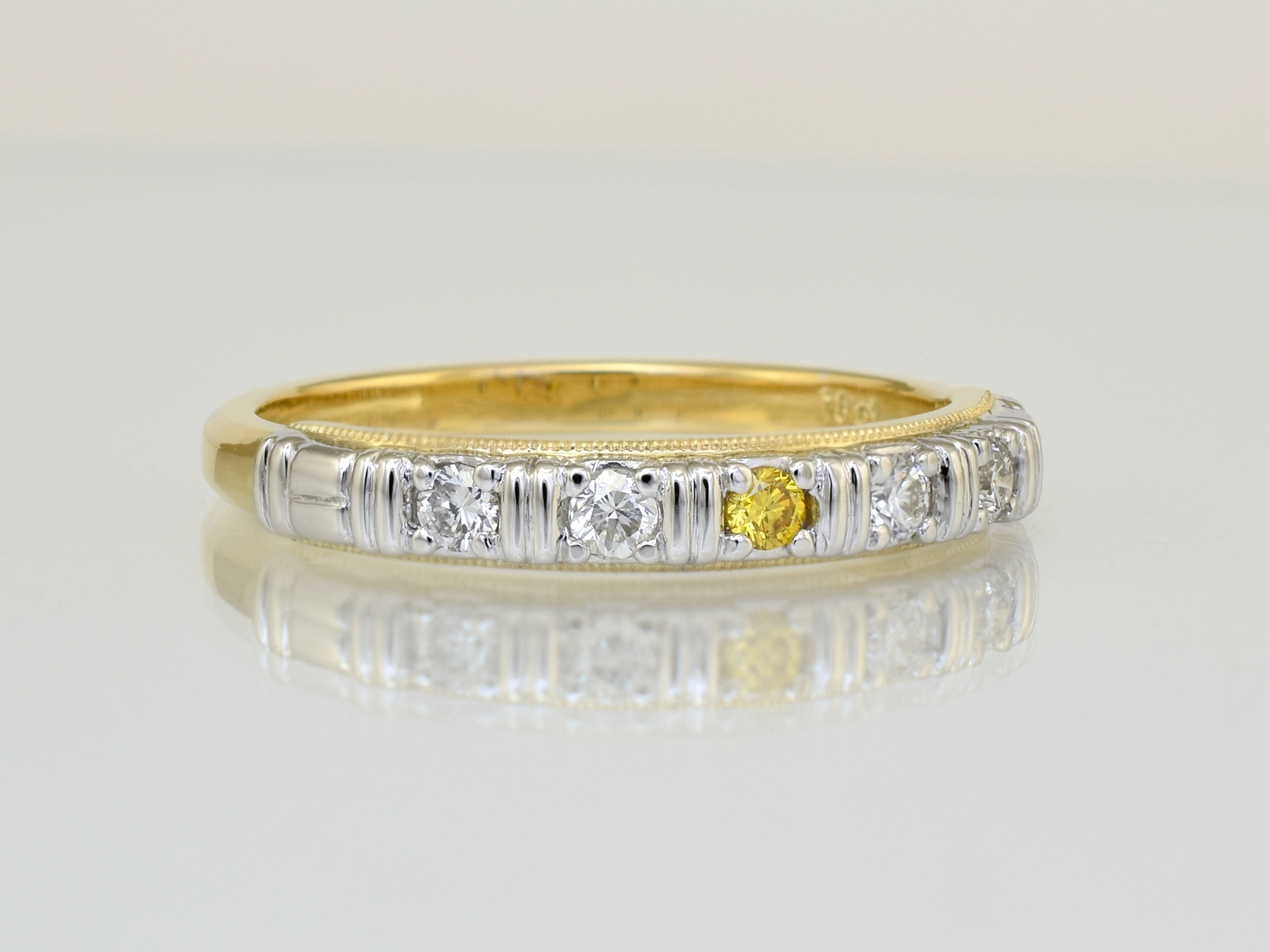 Centre yellow diamond created from the father`s carbon.