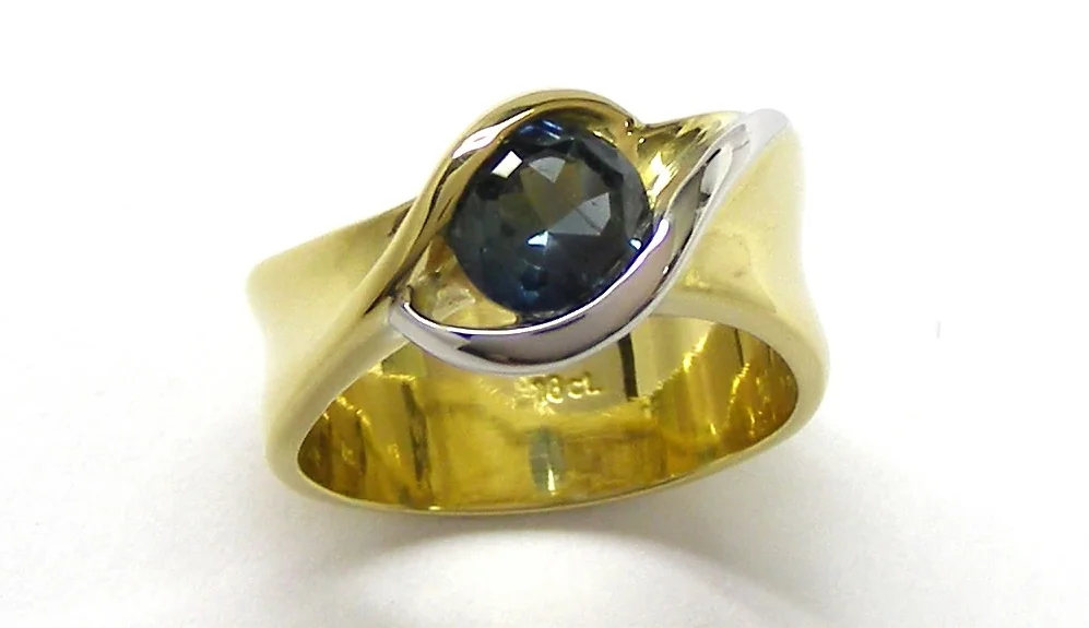 A Sapphire ring I made over 10 years ago would be the design start.
