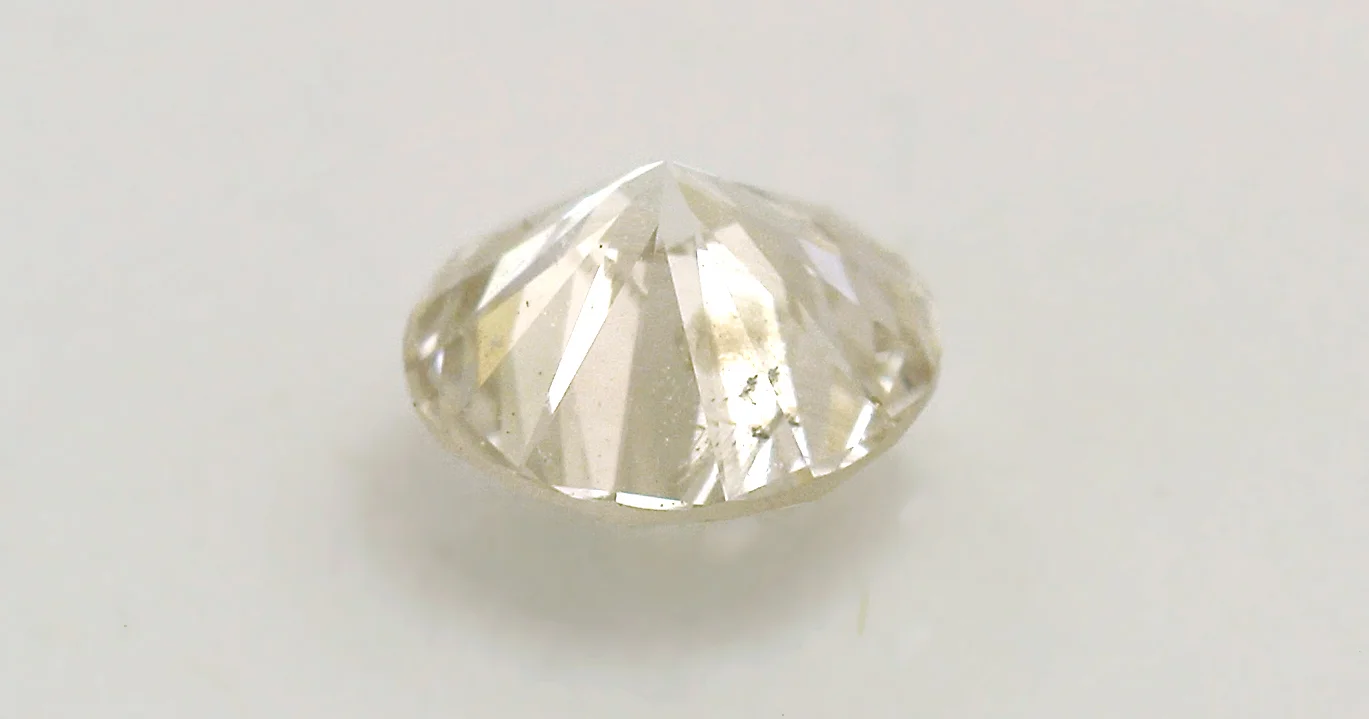 Diamond flaws more visible from the back.