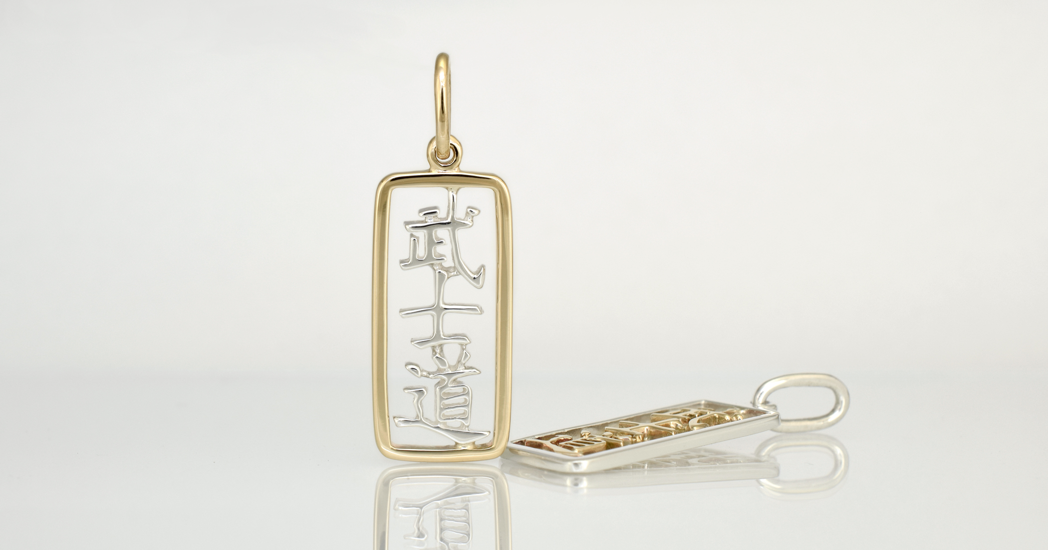 9ct yellow gold frame with Palladium Sterling Silver Kanji.